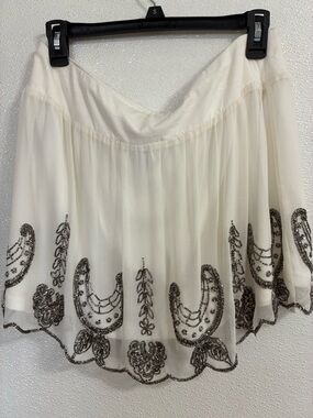 Forever 21 Cream Ruffled Mini skirt with sequin embellishments L ( never worn)